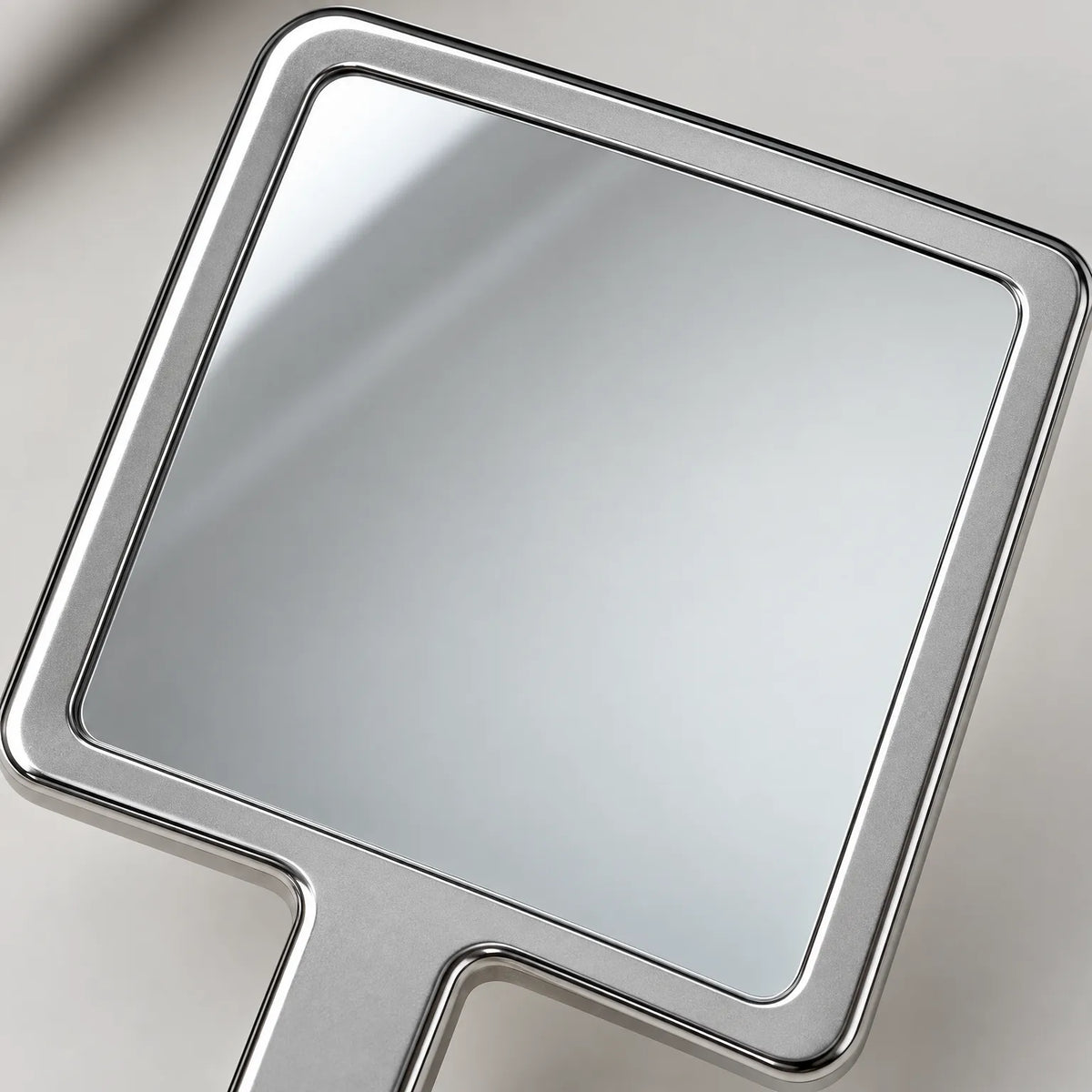 Handheld Vanity Mirror with Textured Metal Design