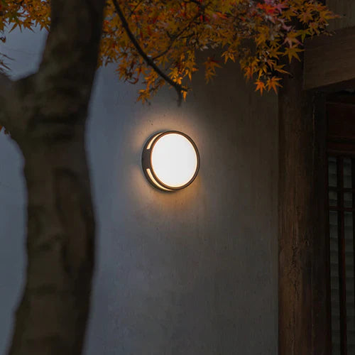 Modern Round LED Metal Wall Light for Outdoors | Nortiq